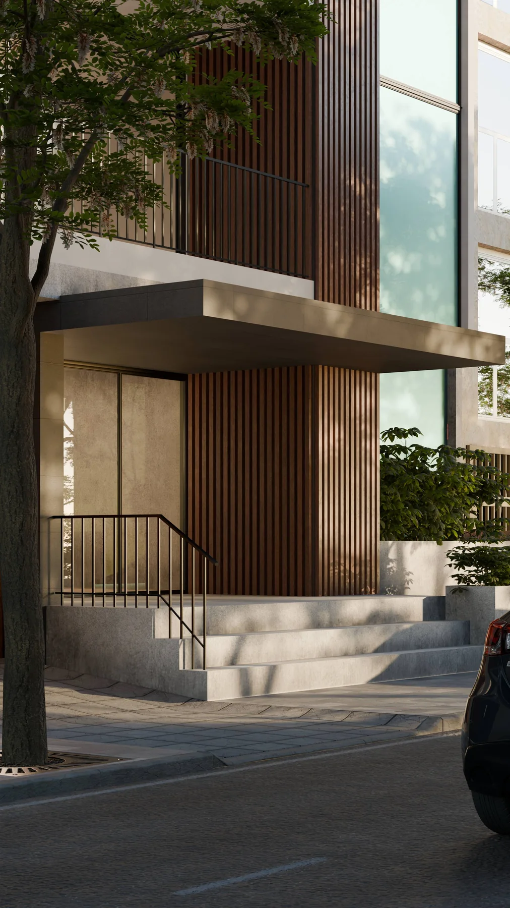 Building entrance at pedestrian level, canopy and slatted timber wall